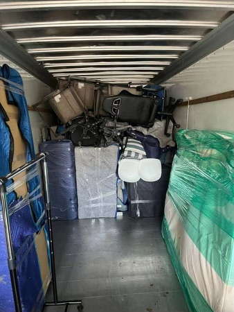Movers at work loading a truck in New Jersey